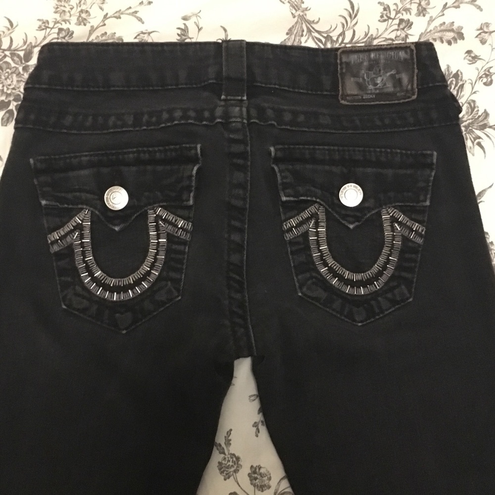 True Religion straight leg black wash jeans.
